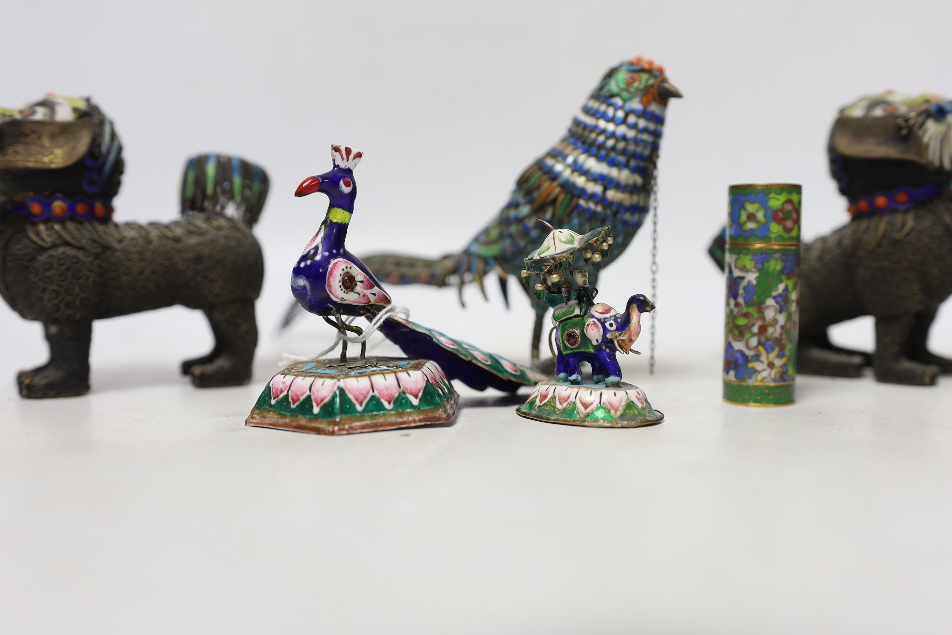 A Chinese white metal enamel pheasant, two similar lions, a cloisonné enamel pot and two Indian enamel figures